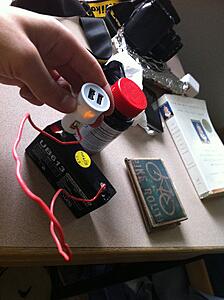 cigarette outlet and phone chargers...-9kuj3cf.jpg