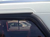 Side slider window rubber trim and 4runner emblems-side-window-driver.jpg