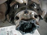 bolt at end of axle after snap ring???-conewashers.jpg