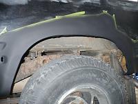 How to deal with rust above wheel wells?-p1030552.jpg
