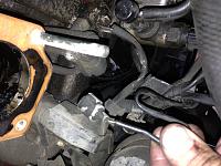 Temperature unit? Clogged radiator hose underneath-photo.jpg