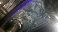 22RE oil leak from passanger side oil pump bolt-yota-tchain-case.jpg