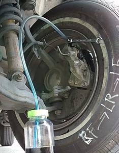 Did front brakes &amp; bleed - what could I have done better (especially that torn boot)?-bleed40.jpg