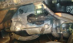 Replacing the clutch - I am stuck at the starter motor - where are the 14mm bolts?-starter03.jpg