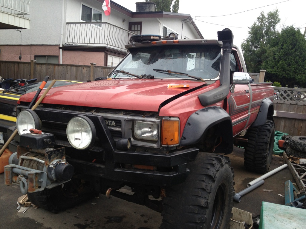 Lifted 87 Toyota pickup 22R snorkel 37s winch - $1000 should i go for it.