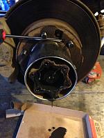 Center cap removal-image-2117940698.jpg
