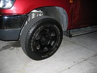 stock rims painted black-img_0005.jpg