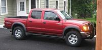 I was told my double cab looks lowered yesterday :( new OEM springs or? to restore it-matts-taco-compressed.jpg