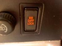 I want my Toyota Tacoma to chirp off the line and burn rubber...-e-lock-button-inside-cab.jpeg