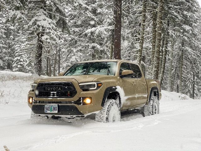 2018 Quicksand color Toyota Tacoma in the snow