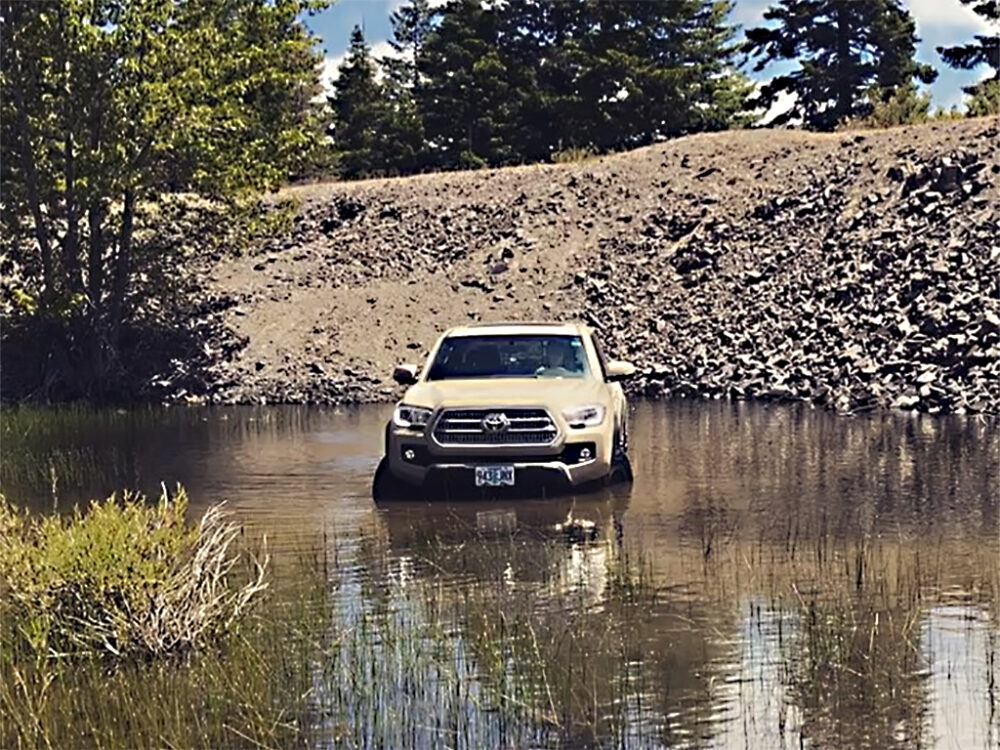 2017 Toyota Tacoma Quicksand tan in water