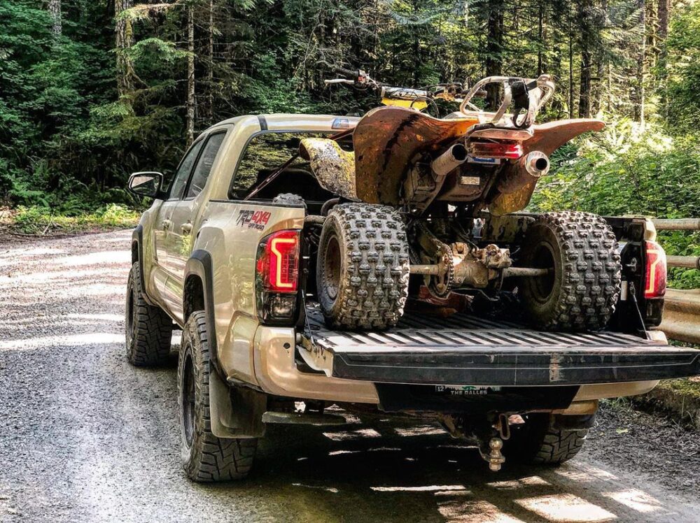 2017 Toyota Tacoma in Quicksand with ATV in the bed